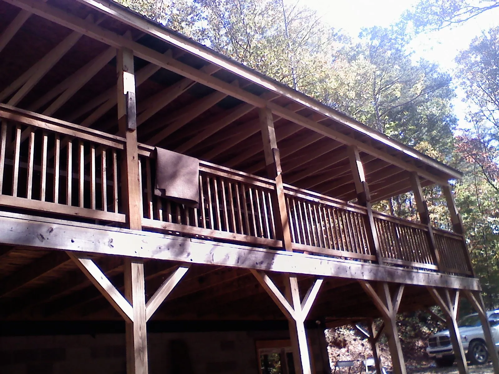 Timber framing under a new elevated porch and deck — Roof Leak Repair in New Lothrop by Roofing Brothers
